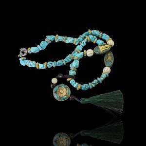 Turkoois collier met Boeddhistische amulet