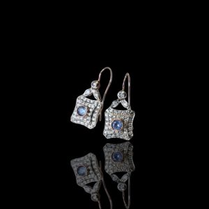 Paar 14 krt. rosé gouden oorhangers met topaas en diamanten, in zilver gezet