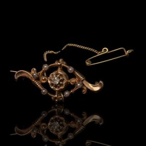 Antieke 14 krt gouden broche met diamant en parels