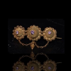 Antieke gouden broche met amethist