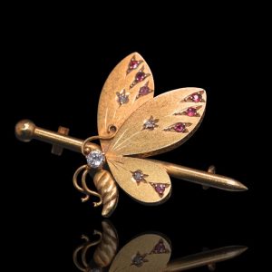 18 krt gouden vlinder met briljant en robijnen
