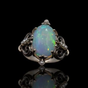 Zilveren ring met Welo opaal en parels