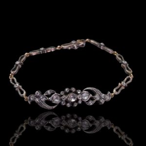 14 krt gouden schakelarmband met diamanten in zilver gezet