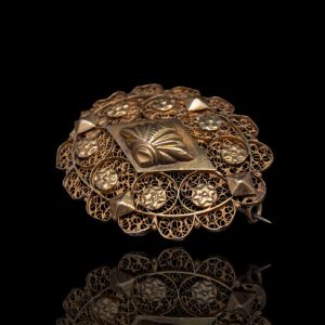 Antieke gouden klederdracht broche (speld onedel)