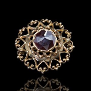 14 krt gouden broche met granaat