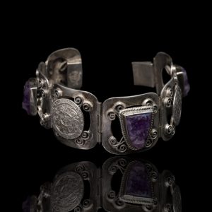 Mexicaanse zilveren schakelarmband met gesneden Azteekse gezichten en miniatuur kalenders